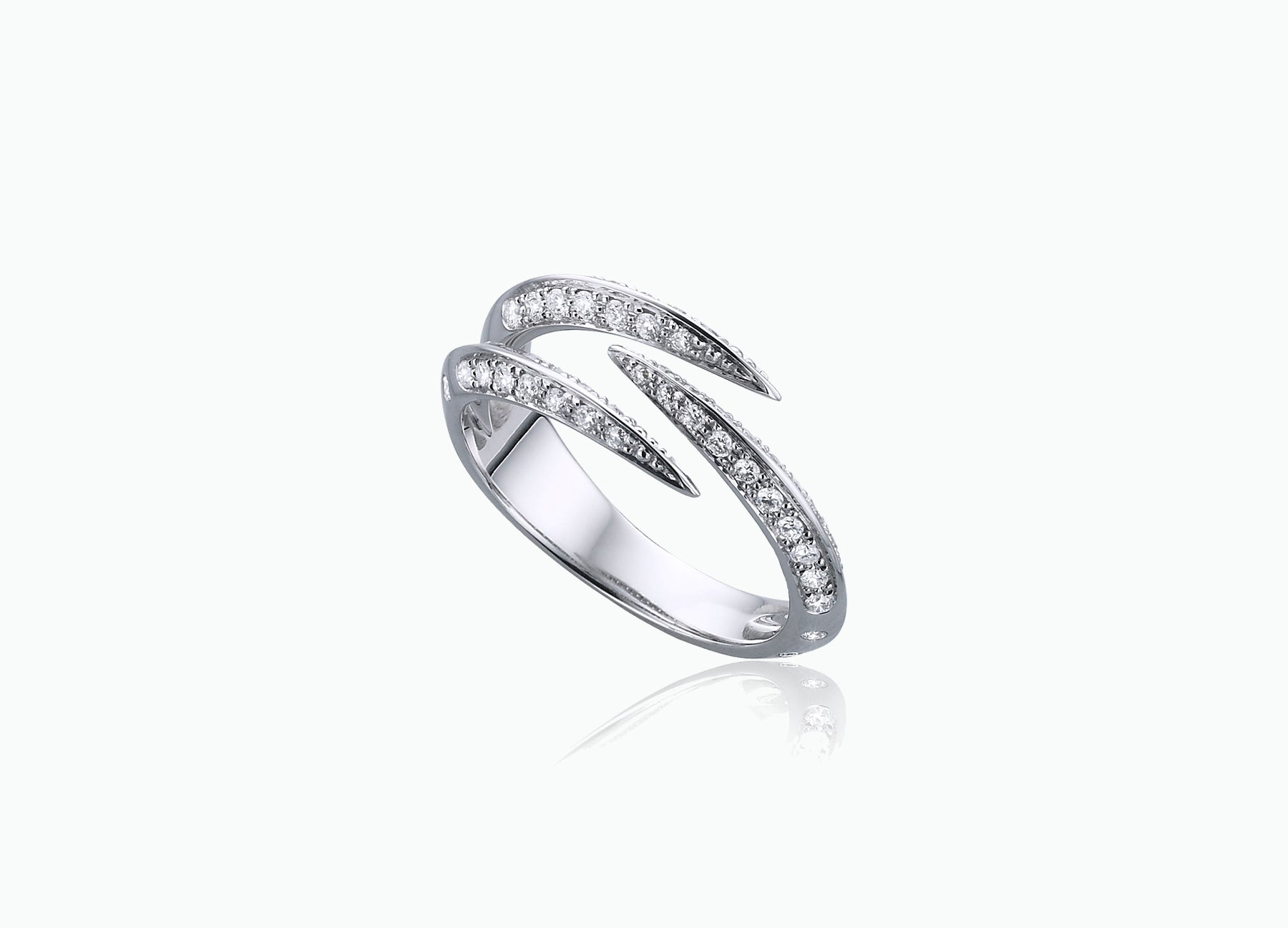 BLACK STAR THREE CLAW RING WITH WHITE DIAMONDS