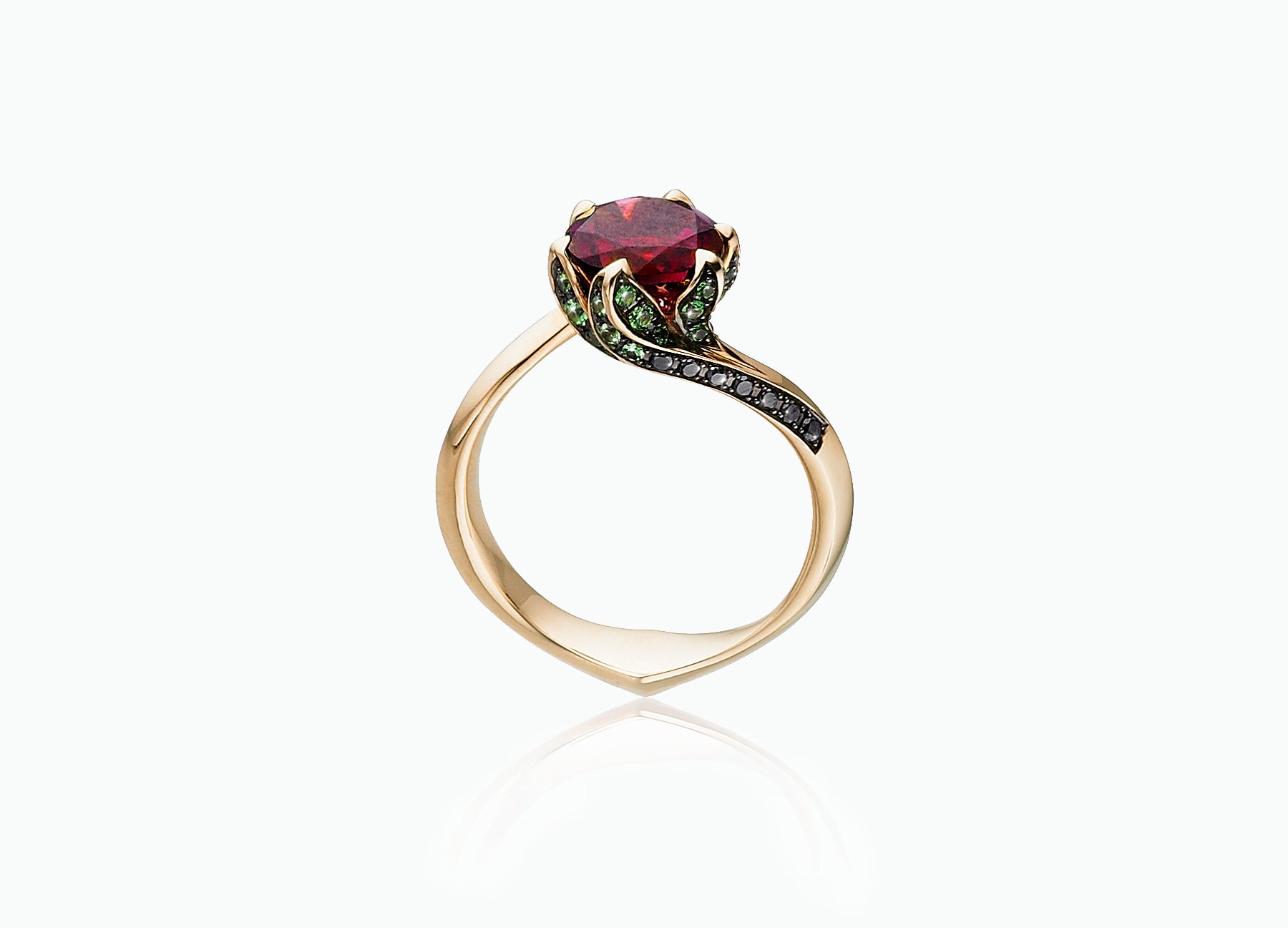 Lily Pad engagement ring in 18K yellow gold set with a rubellite tourmaline centre stone side view