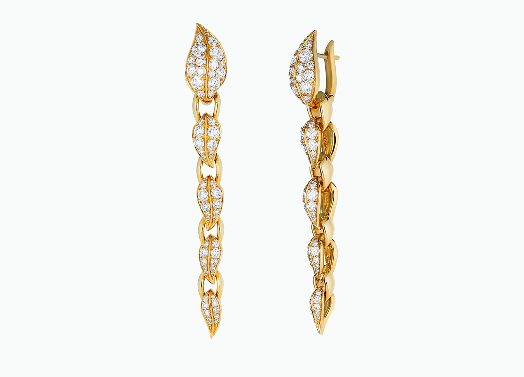 Gold earrings with diamond accents on a white background