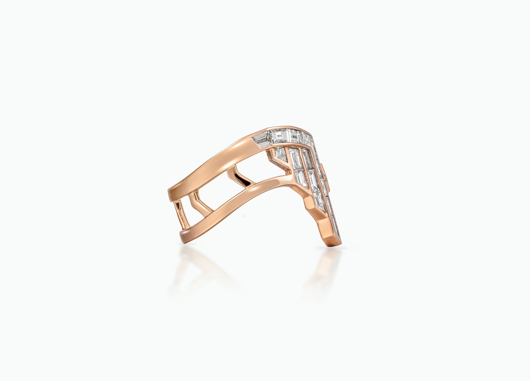 Elegant Art Deco diamond ring showcasing intricate design with baguette and tapered diamonds set in rose gold