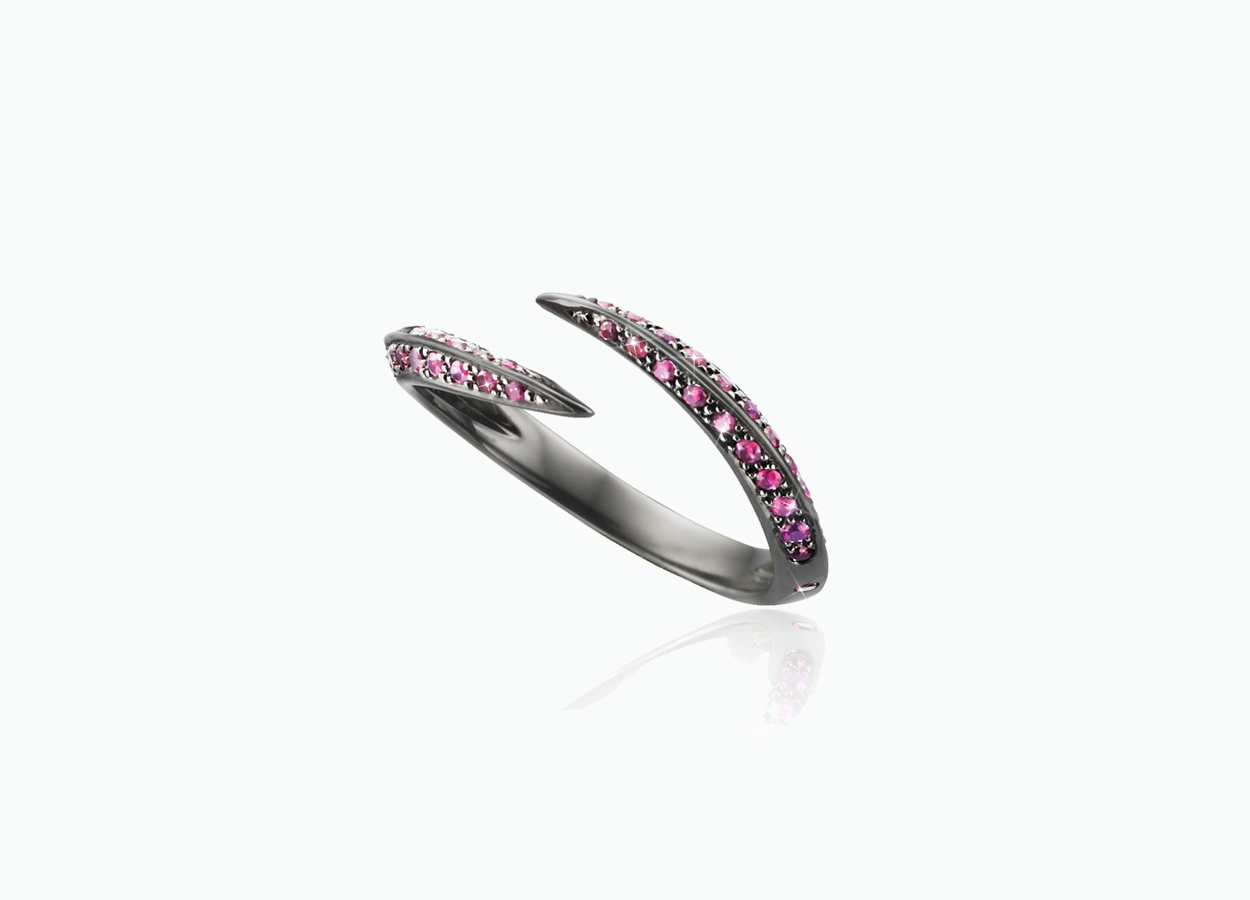 BLACK STAR SINGLE CLAW RING WITH RUBIES