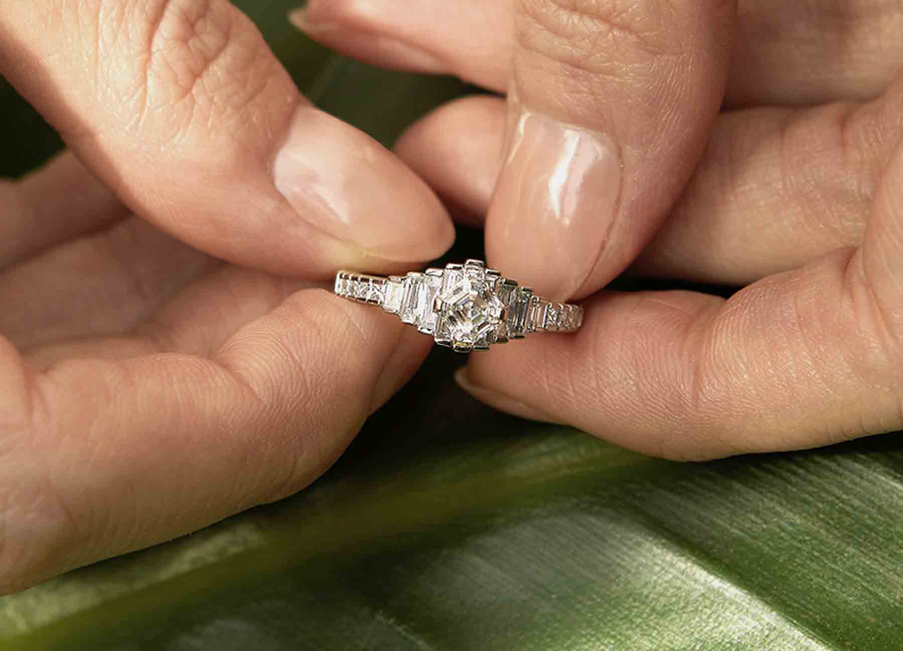 Chrysler Platinum Diamond Engagement Ring featuring an Asscher-cut diamond with baguette and princess-cut diamond