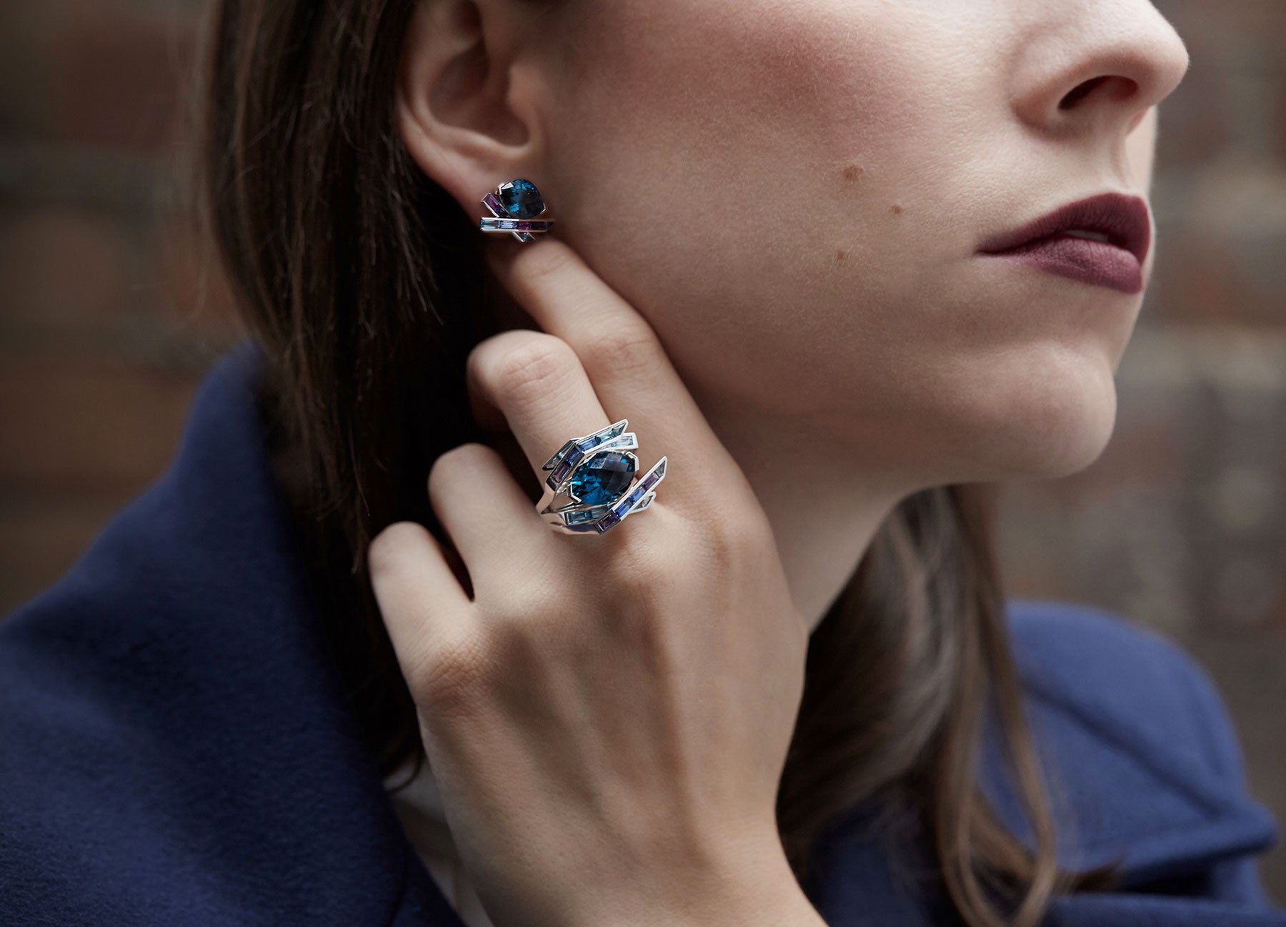 Blue Topaz Cocktail Ring and matching Earring in 18K white Gold worn Fine Jewellery by Tomasz Donocik Edit alt text  Edit alt text