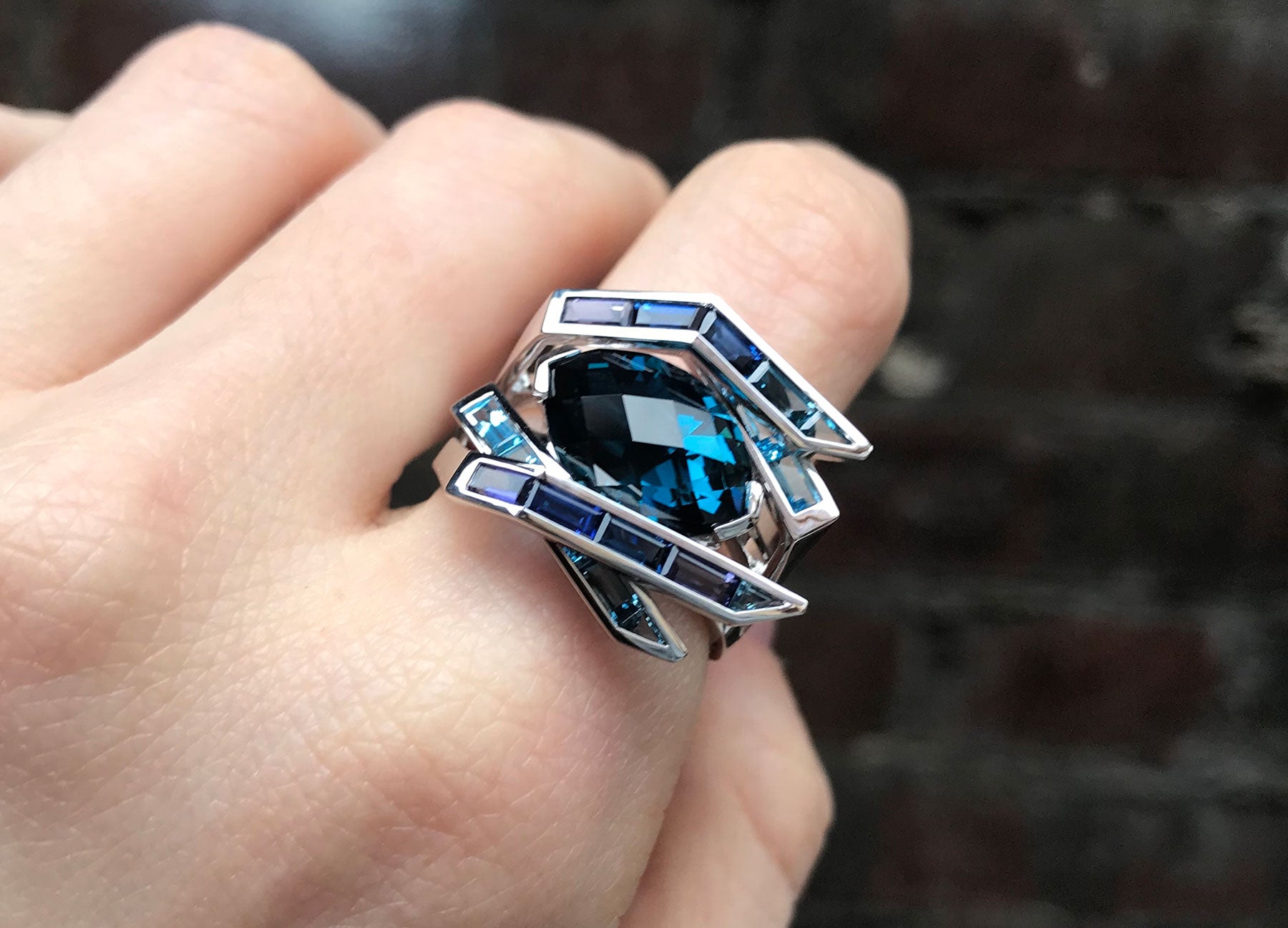 Blue Topaz Cocktail Ring in 18K white Gold worn on hand Fine Jewellery by Tomasz Donocik 