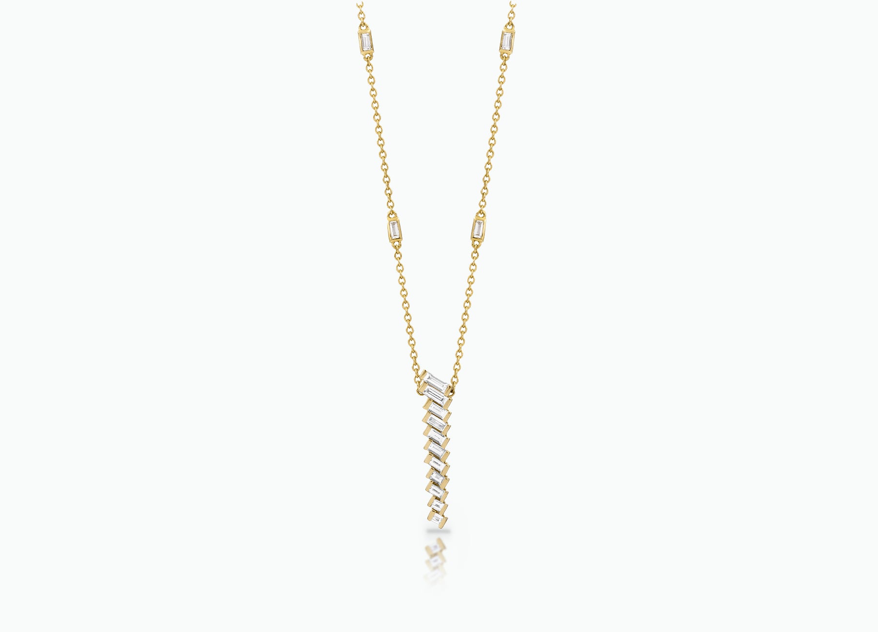 Pendant with baguette white Diamonds that create a chevron pattern. Made from rose, yellow or white 18k Gold.
