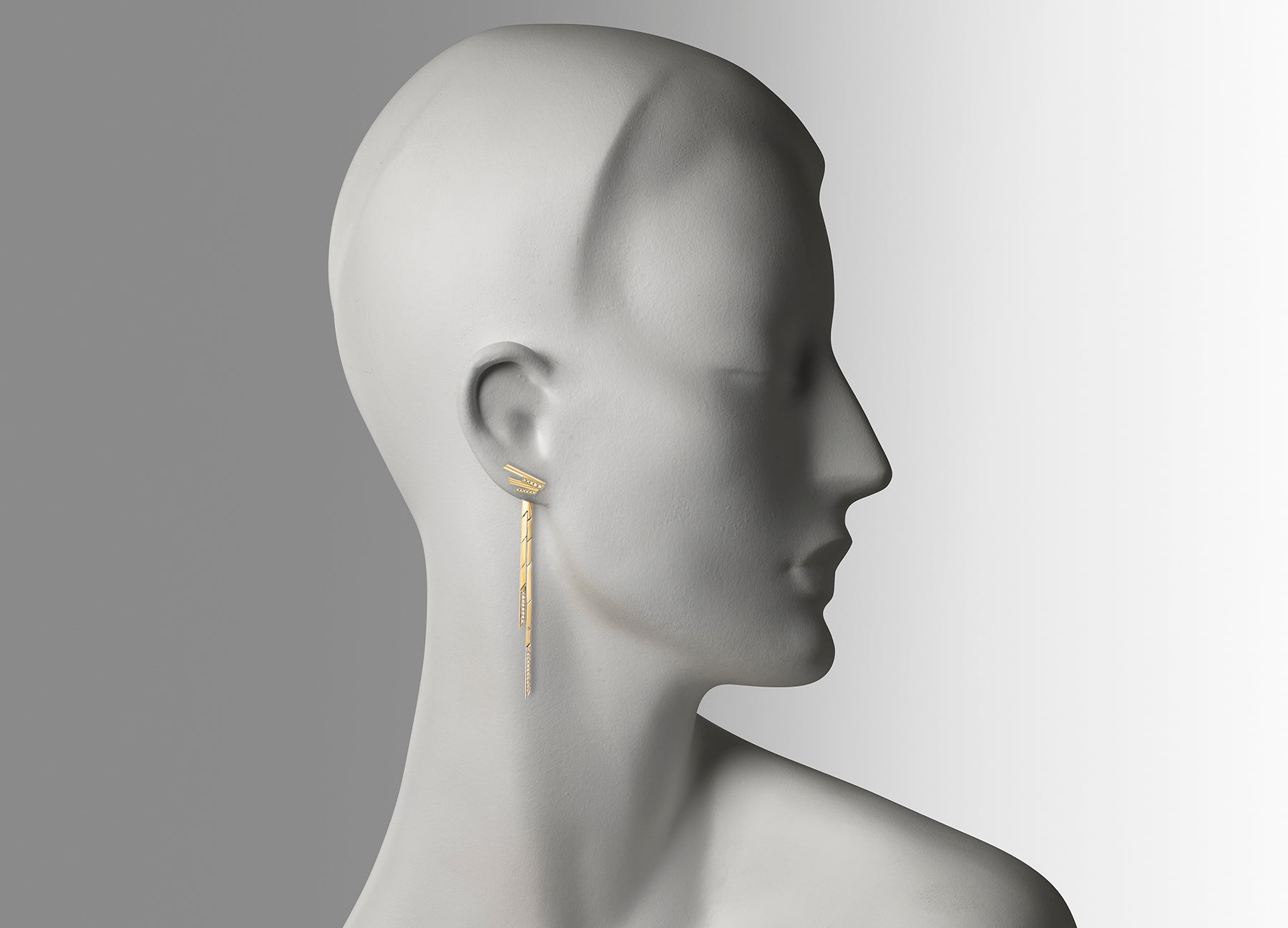  Mini Stellar Stud earrings with detachable drops in 18K yellow gold with white diamonds by Tomasz Donocik worn on mannequin
