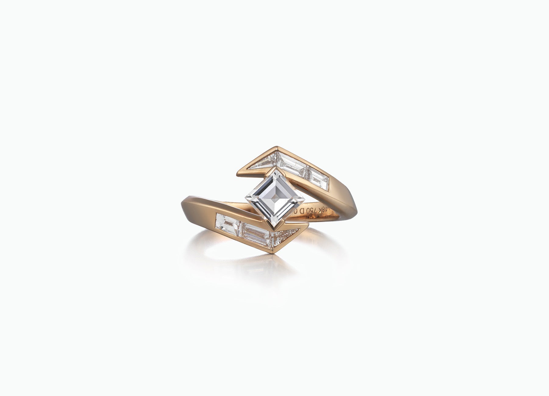 Stellar engagement ring in 18K rose gold with baguette-cut white diamonds and a square-cut GIA certified diamond.