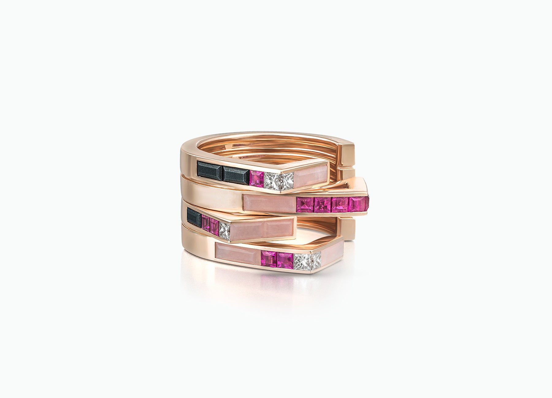 Stellar Pair of Stacking rings in 18K rose gold set with rubies and diamonds and pink opal by Tomasz Donocik Seen together