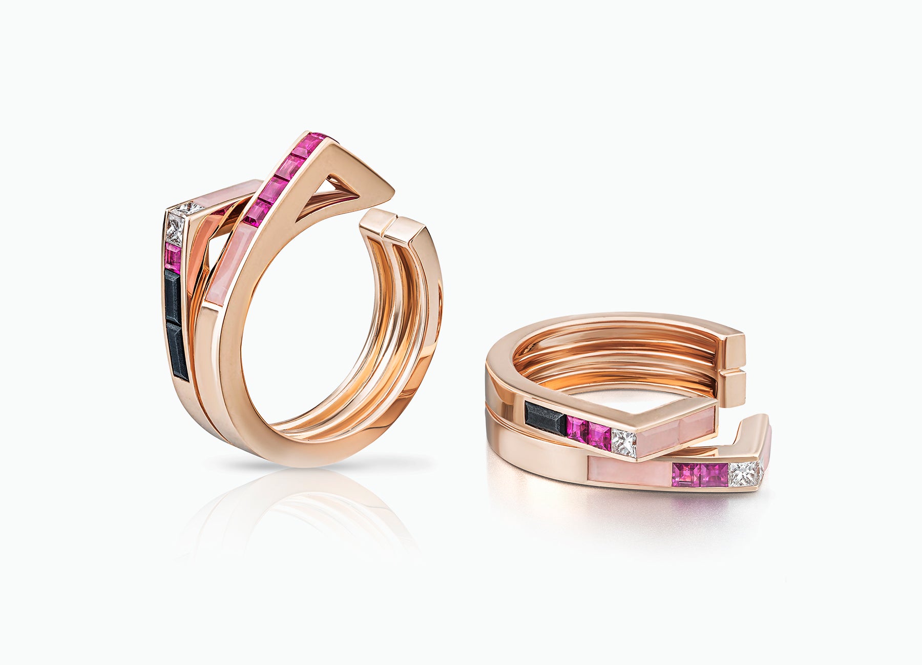 Stellar Pair of Stacking rings in 18K rose gold set with rubies and diamonds and pink opal by Tomasz Donocik Seen apart