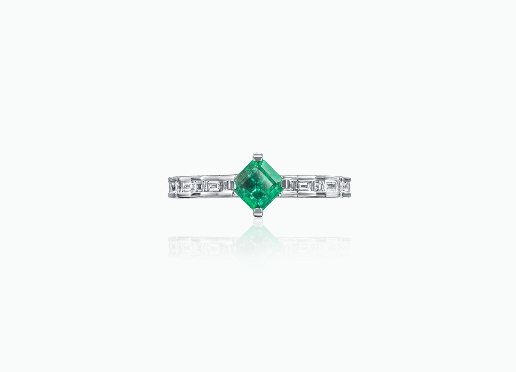 Emerald and Diamond Pleat Art Ring featuring a vibrant emerald centre stone and baguette diamonds, customisable in 18K gold
